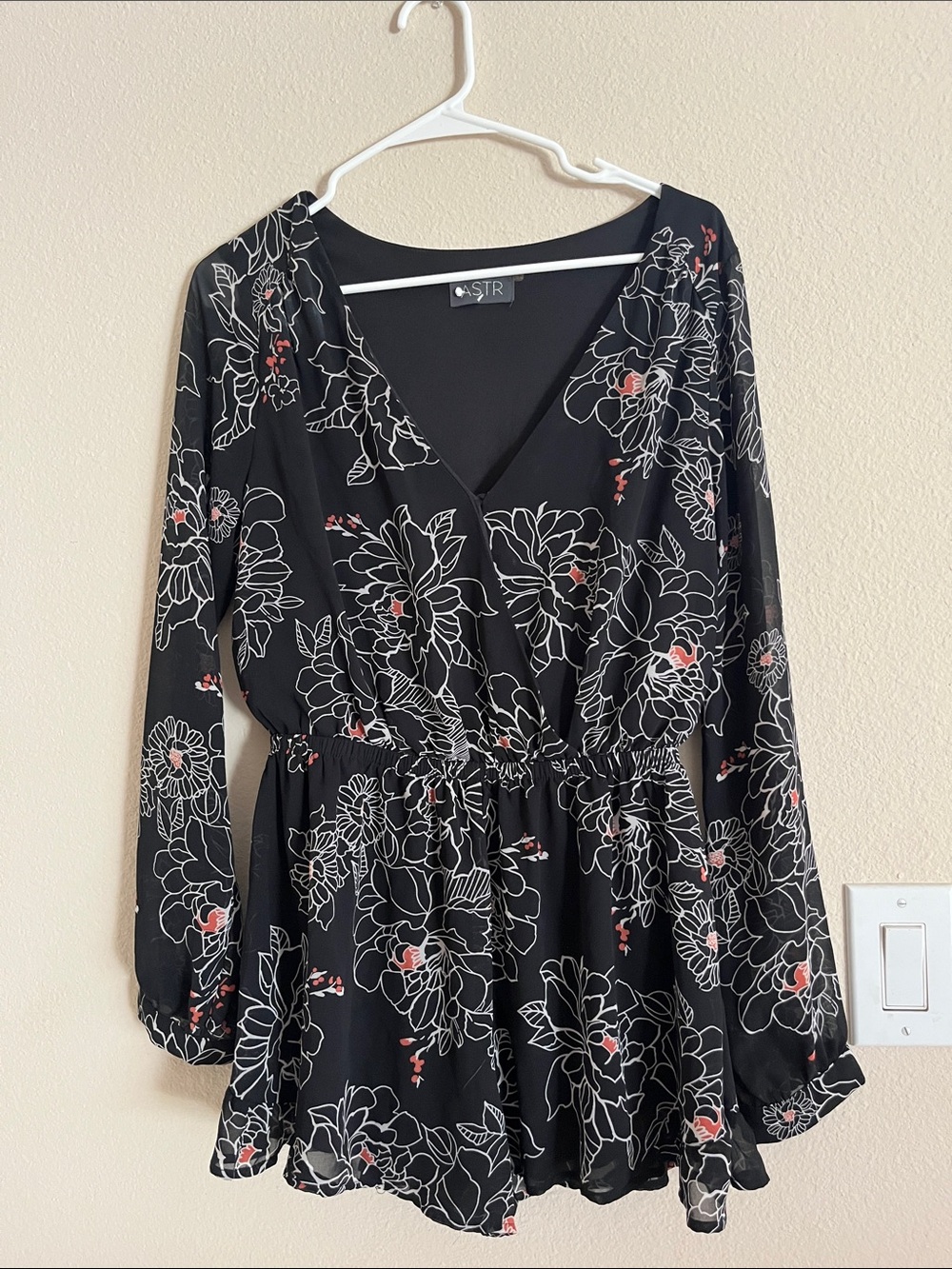 Astr Black Floral Surplice Long Sleeve Romper with Coral Accents